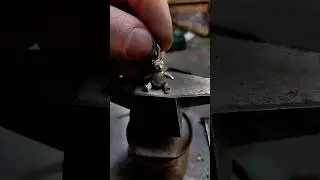 Мишка из серебра с подвижными ручками, ножками и головой.