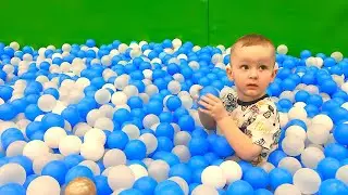 Yarik plays in a giant indoor playground with toys for kids