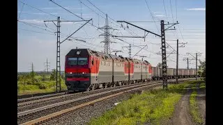 Электровоз 2ЭС6-830/1165 с грузовым поездом