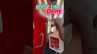 Dent repair on a body line using hot glue. #autobodyrepair #paintlessdentrepair #dentrepair #diy