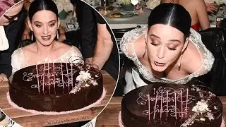 Katy Perry is surprised with a cake enjoys belated birthday celebrations at Vogue dinner