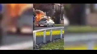 Fire brigade tackle Vauxhall Corsa engulfed in flames