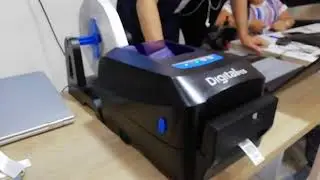 Digital POS DIG1625CT imprimiendo y cortando Marquillas