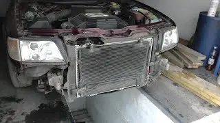 Replacing the engine cooling radiator on an Audi A6 C4