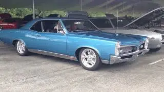 Volume up!! Rowdy 1967 Pontiac GTO w/ exhaust cutouts. Open exhaust at 15 seconds.