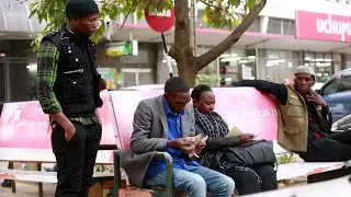 Thieves robbing a man