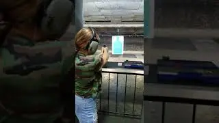 Daughter's first time firing a pistol.