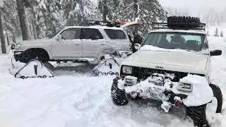 Snow wheeling in a blizzard on tracks. Snapped my U-joint!