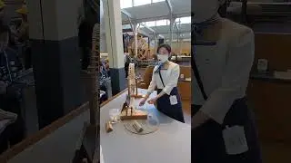 Demonstration of spinning cotton at the Toyota Museum in Nagoya, Japan