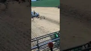 Father and Son working wheat Harvest #2024