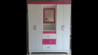 Guarda roupa rosa com branco (3 gavetas,4 portas 1 nicho e 1 espelho)