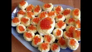 Перепелиные яйца, фаршированные икрой.
