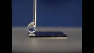 Water droplet moving across a wettability gradient