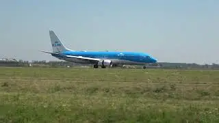 Amsterdam Schiphol landing of KLM Boeing 737-800 on a sunny Sunday