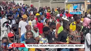 Flash! Revolisyon an kòmanse  - Patizan Guy Philippe yo pran lari nan Port-au-Prince