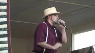 Amish Auctioneer Sells Colorful Quilt