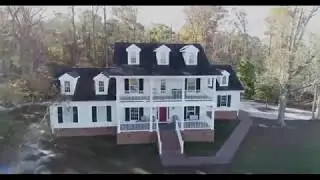 Amazing 11 acre custom home overlooking the James River in Smithfield