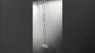 Falling Paperclips Chain Down