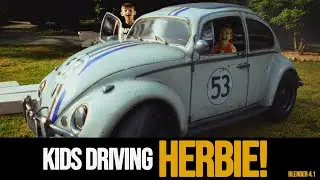 Kids driving Herbie into Jenga blocks!