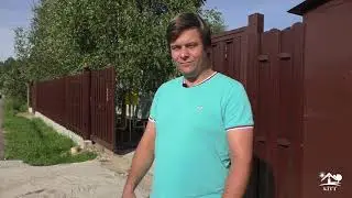 Откатные ворота Doorhan Sliding 1300. Забор по фасаду из двустороннего евроштакетника на ленте.