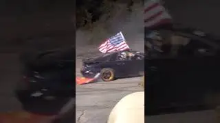 Grinch being drug by a catfish camaro doing burnouts and donuts 