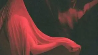american breast with a full head of hair