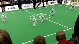 Humanoid Robots playing soccer at the RoboCup 2013