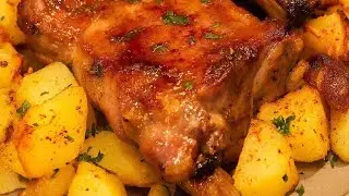 Pork ribs with potatoes in the oven.