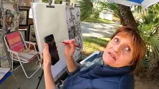 Getting a Face painting from a street female artist for a dear person in Palma De Mallorca