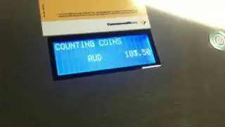 Counting coins at Box Hill CBA.