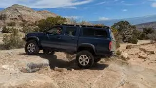 Playing in the rocks with a Turbo Nissan Xterra and Supercharged 2000 Frontier