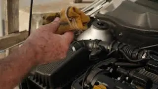 Checking the oil level of a car
