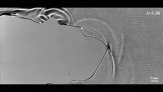 Tensile cracks can shatter classical speed limits