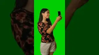 Girl sending a selfie by cell phone on agreen background video |#greenscreen #shorts #viral #youtube