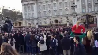 Playing badminton in front of the Buckingham Palace