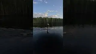 Нейросеть: сапбордист, тайга, круглая вода, грести, закат #shorts