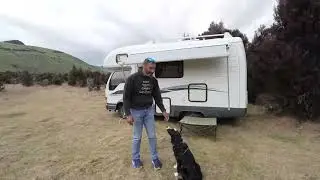 Winter RV Camping With Dog In Rain Storm