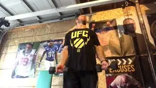 Garage gym four way dumbbell warm up for shoulder training