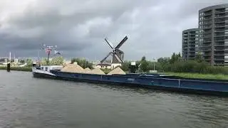 💨 Gouda's Windmill: A Beautiful Journey by Boat 🇳🇱