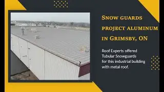 Snow guards on metal roof industial building in Grimsby, Ontario. Snow guards project in Canada #1