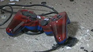 Smashing a Naki 78501 Spider-Man PlayStation 2 Controller