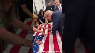 Trump Signs American Flag on Anniversary of 9/11