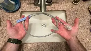 Unclogging bathroom sink drain naturally without chemicals. 2 minute fix.