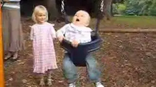 Sofie pushing Elliot in Swing