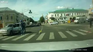 Biker Lands on Car Roof After Crash.