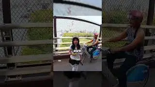 Eine Bikerin half einem Mädchen auf der Brücke 🤝