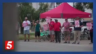 On this Labor Day, we talked to AT&T workers marking 18 days on strike