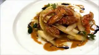 Raviolo with White Asparagus, Lobster Ragout, Squid Ink & Parsley