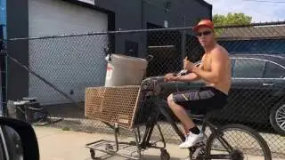 Bicycle and shopping cart hybrid turning scrap metal into cash.