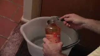 Cleaning The Floor With Pine Glo Orange